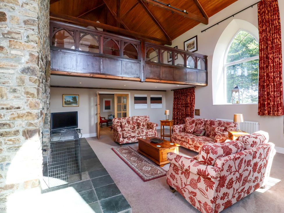 A living room with sofas and a coffee table at The Old Chapel in Clovelly