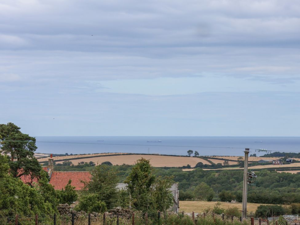 View of the ocean with ships and fields at Beacon in Gerrick near Moorsholm