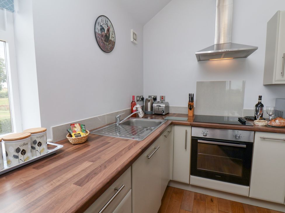 A kitchen with an oven and sink at Freeborough Gerrick near Moorsholm