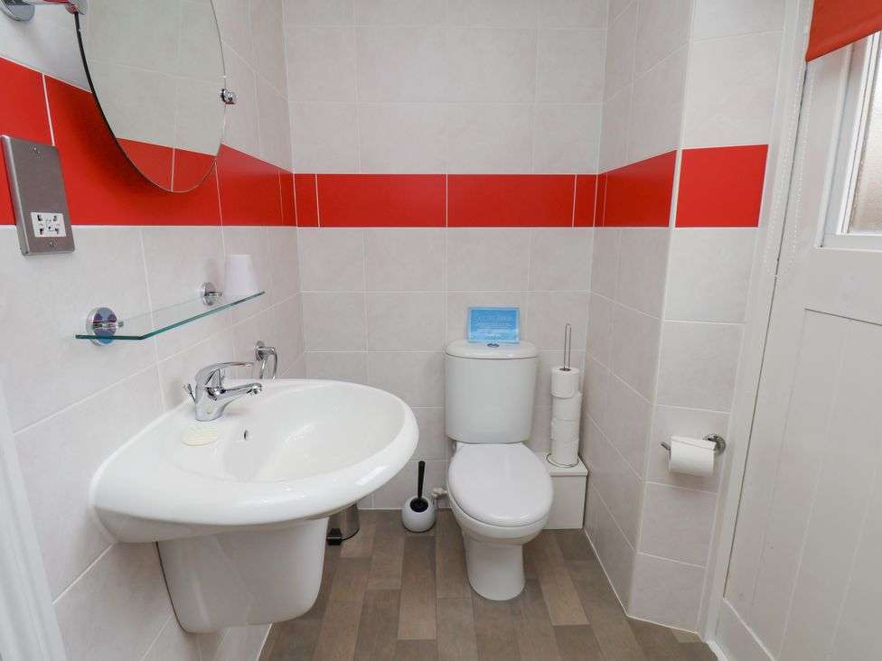 A bathroom with a sink and toilet at Freeborough in Gerrick near Moorsholm