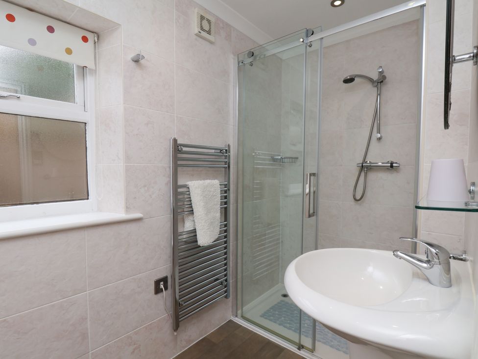 A bathroom featuring a shower, sink and towel radiator at Blakey Gerrick near Moorsholm