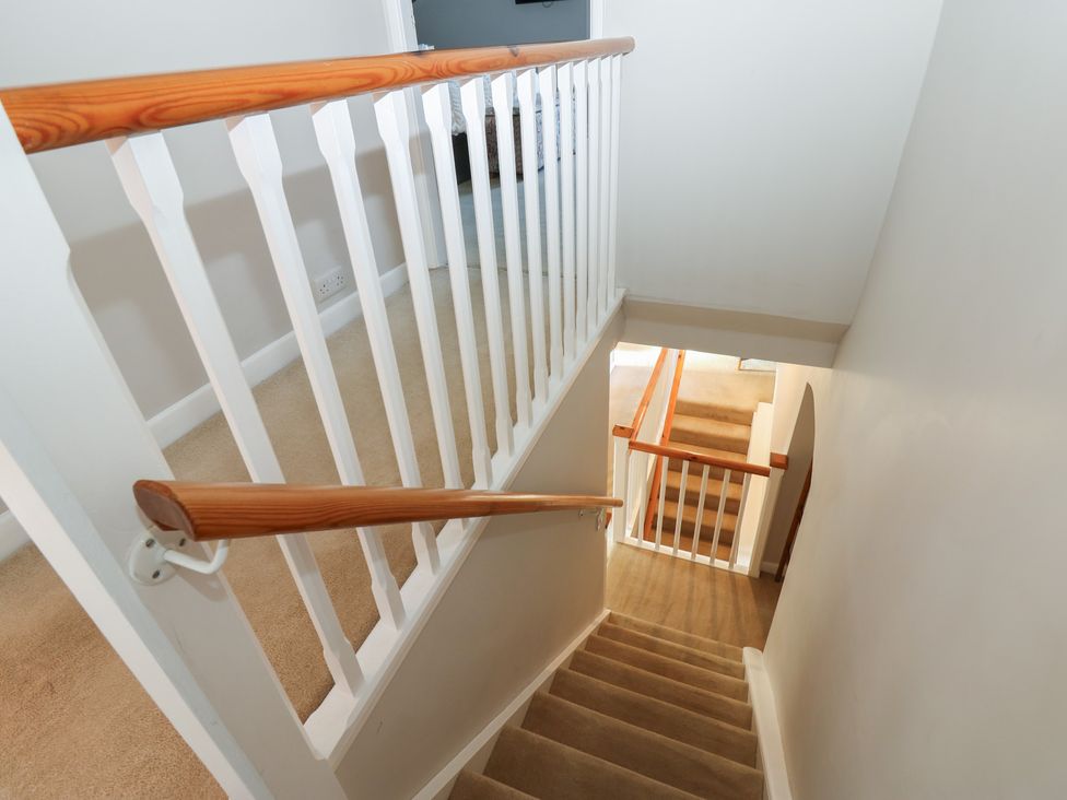 A staircase leading to a landing at Hillside View in Hawes