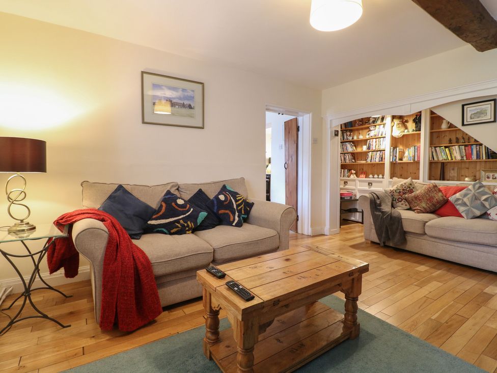 A living room with sofas and a coffee table at Ash House in Alton near Alton Towers