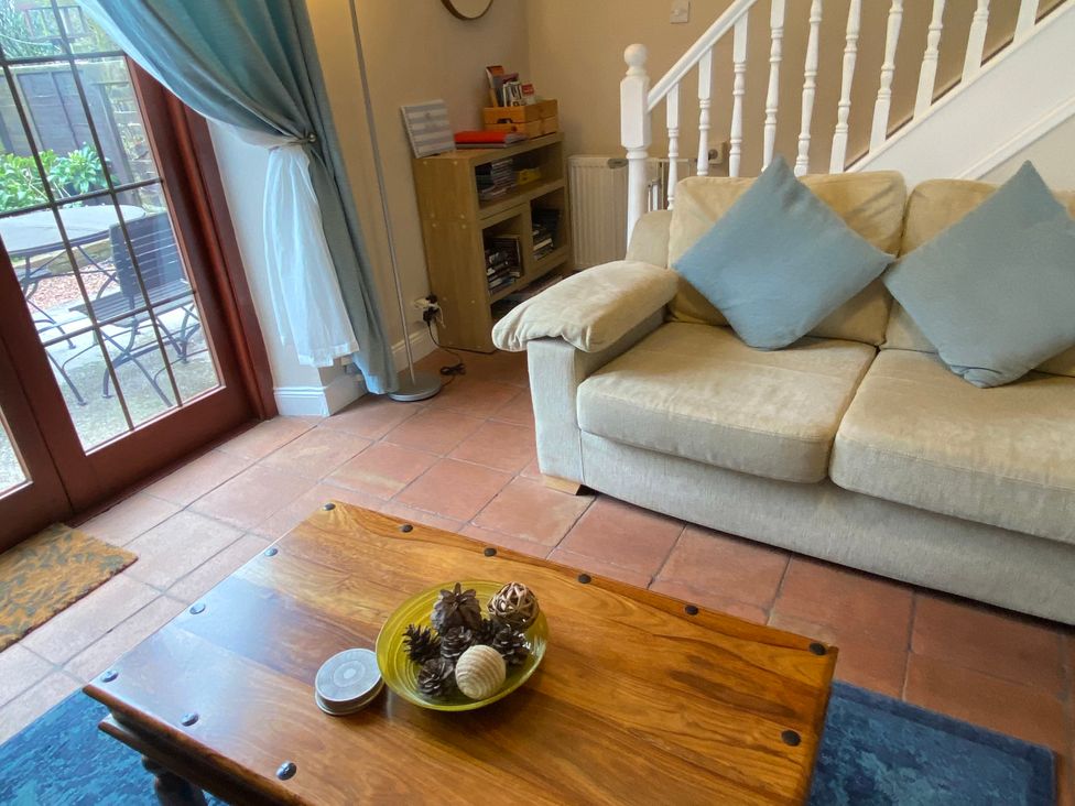 A living room with a sofa and coffee table at Sea Lily New Haggerston near Holy Island