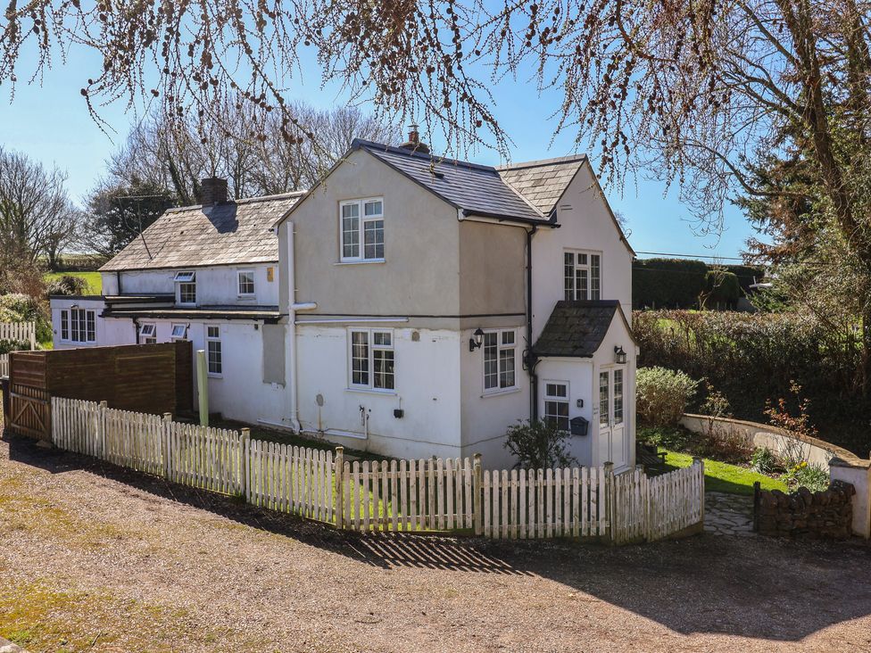 A house with a fenced garden at The Old Smithy in Dottery near Bridport