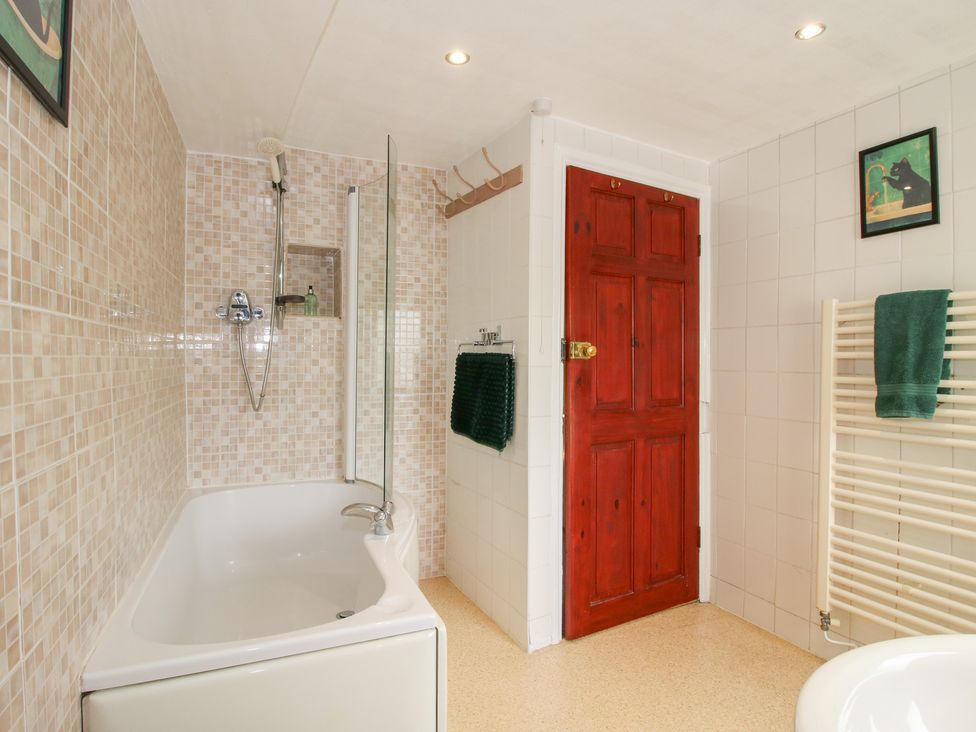 A bathroom with a bathtub and shower at The Laurels in Bishop's Castle