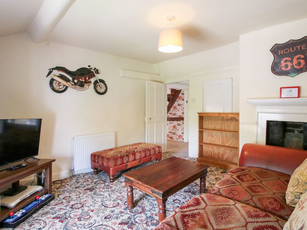 A living room with a sofa and coffee table at The Laurels in Bishop's Castle