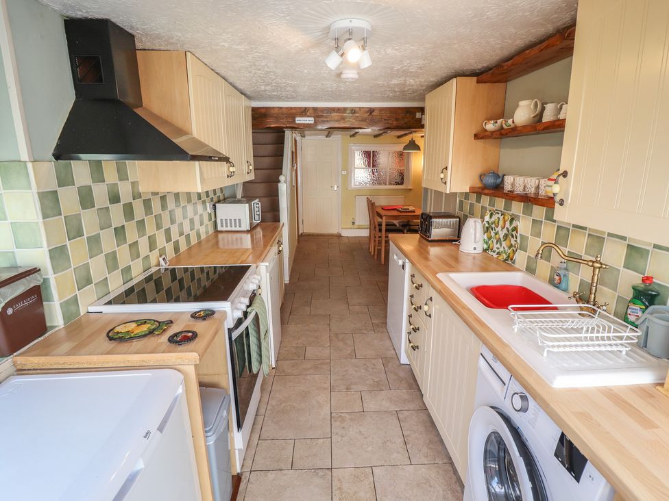 A kitchen with appliances and fixtures at 29 High Street, Aldeburgh