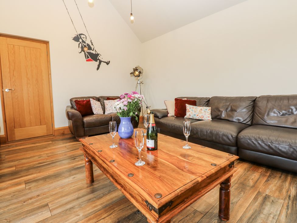 A living room with a coffee table and sofa at Jacob's Lodge in Eggleston