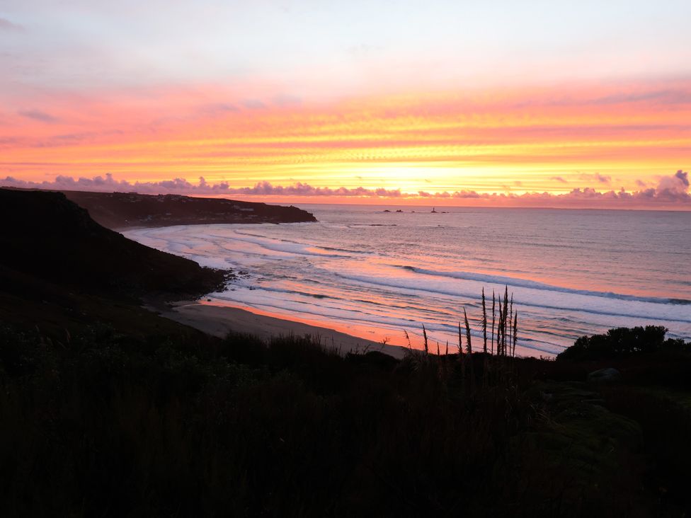 A sunset over the ocean at Cragford in Sennen Cove
