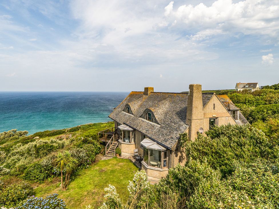 A house overlooking the ocean with a garden at Cragford in Sennen Cove