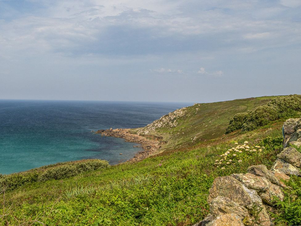 A coastal view featuring cliffs and the ocean at Cragford in Sennen Cove