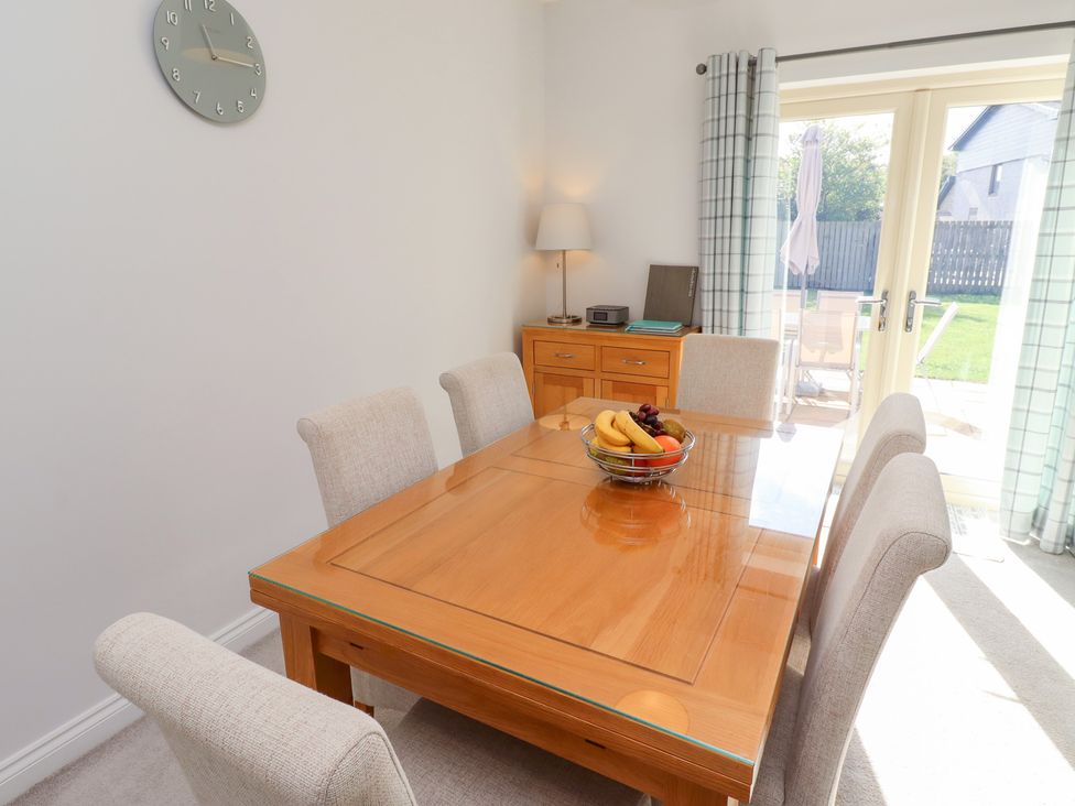 A dining room with a table and chairs at The Haven in Embleton