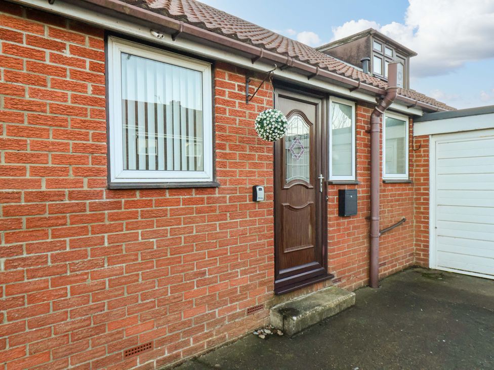 An entrance with a door and a window at La Rochelle in Whitby