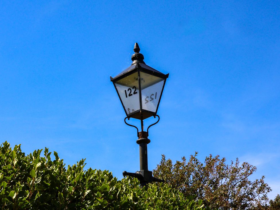 A lamp post with the numbers 122 and 155 at Seacrest Lodge in Scarborough