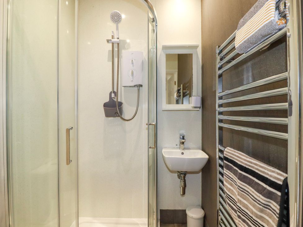 A bathroom with a shower and sink at Kitticarn Sennen Cove near St Just