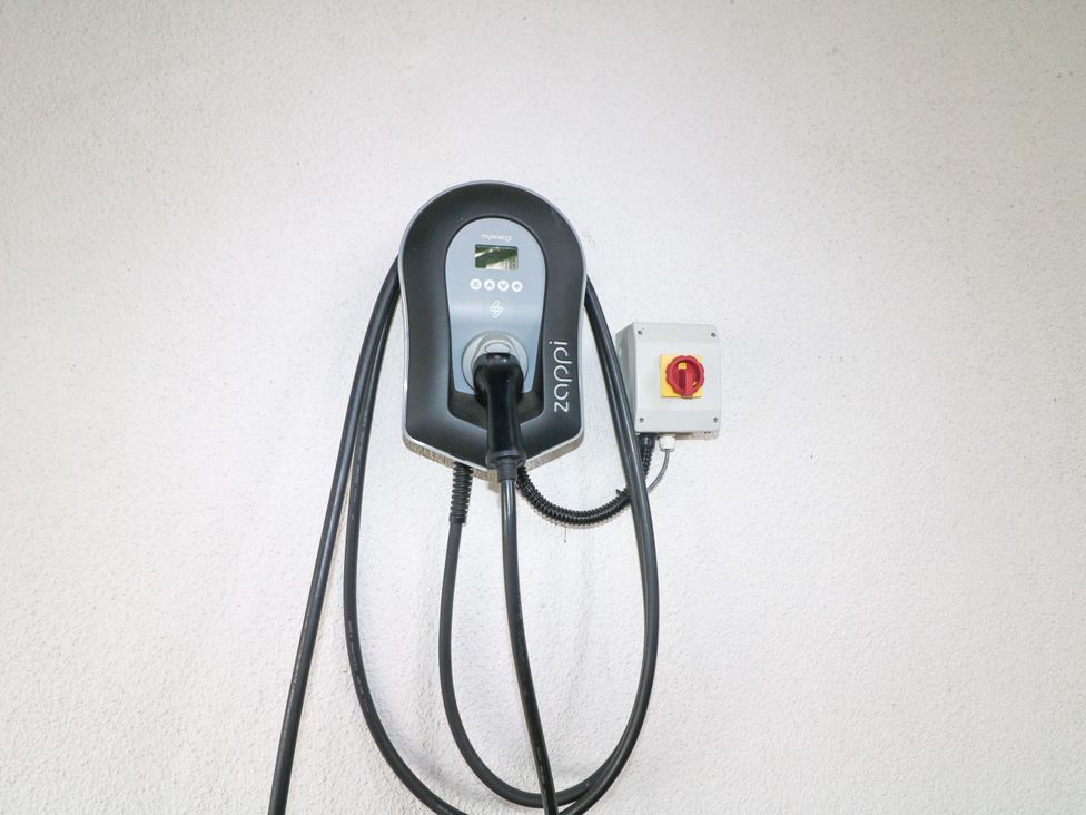 An EV charger mounted on a wall at Curradoon House in Touraneena, County Waterford