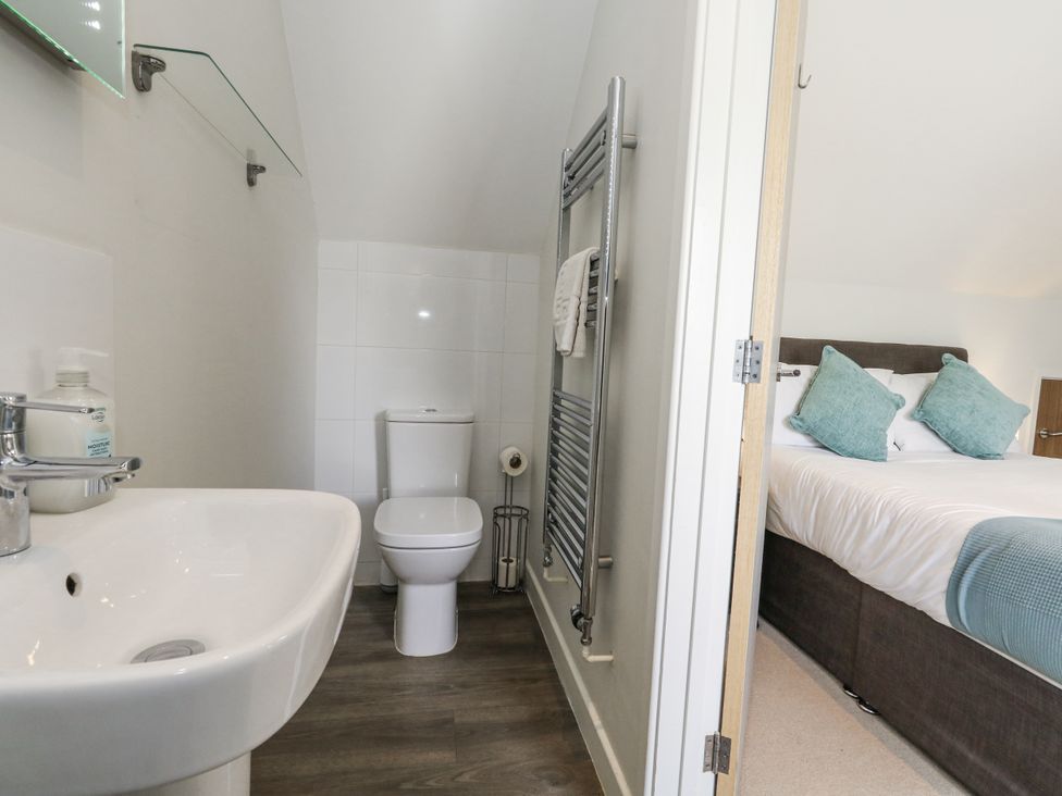 A bathroom with a sink and toilet at Budmouth Upwey near Weymouth