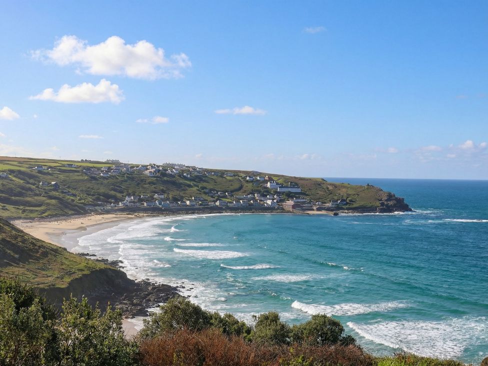 A coastal view with beach and hills at Brook House in Sennen Cove near St Just