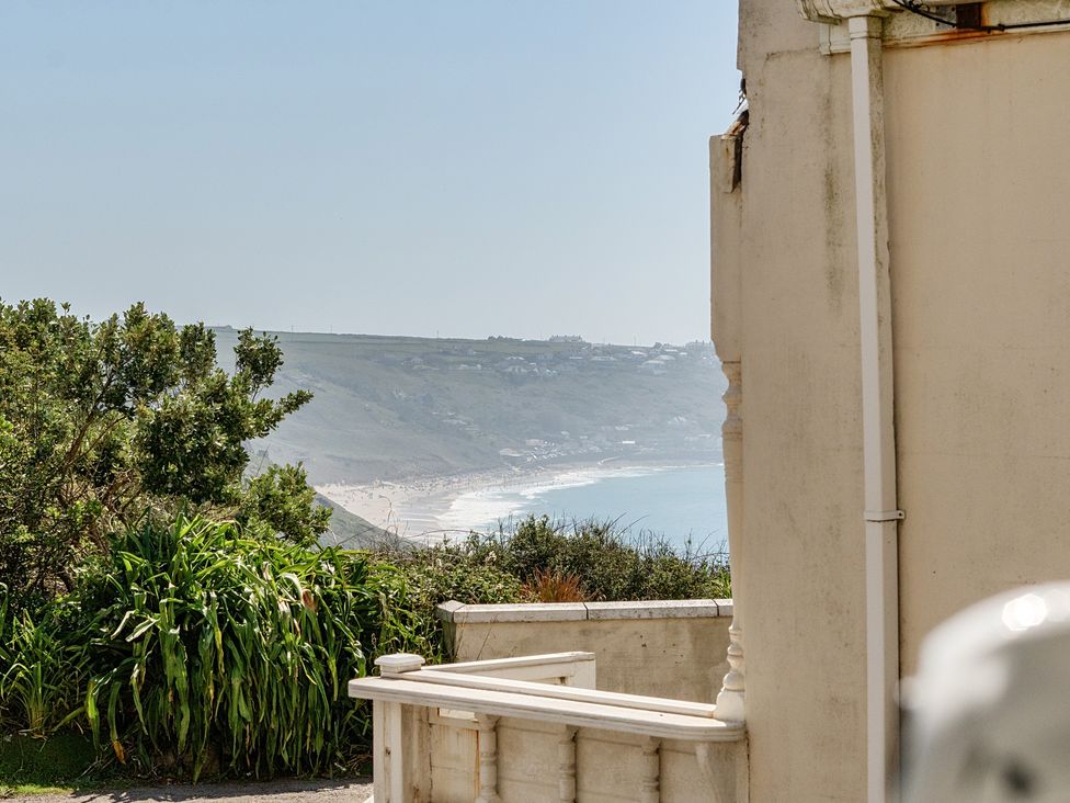A view of the ocean and beach from a property at Brook House in Sennen Cove near St Just