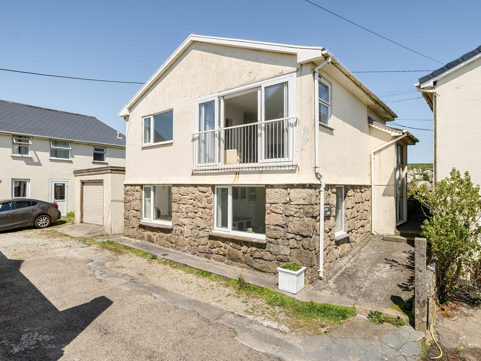 A house with a garage and car at Brook House Sennen Cove near St Just