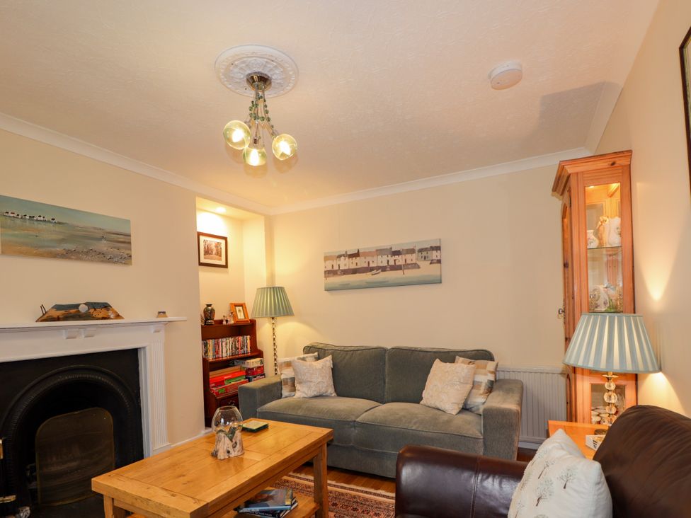 A living room with a sofa and coffee table at Seascape in Portknockie