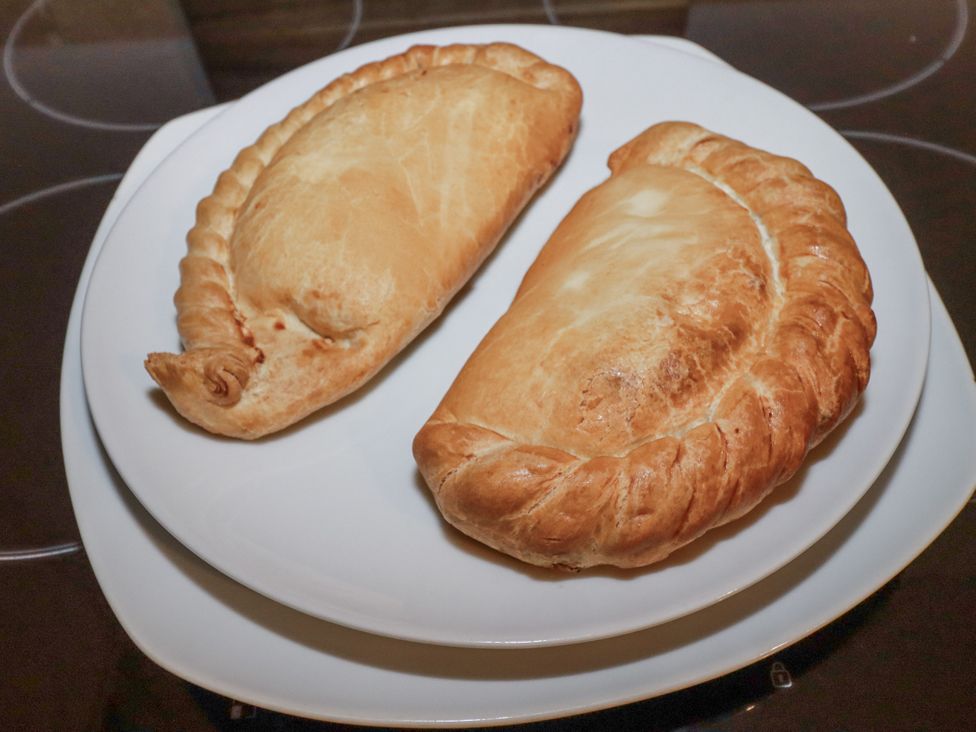 A plate with two calzones at Bramble Barn Inches near Lanivet