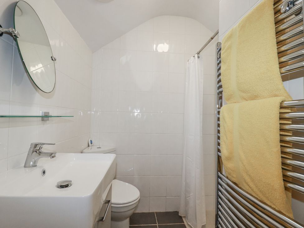 A bathroom with a sink and toilet at Bramble Barn Inches near Lanivet