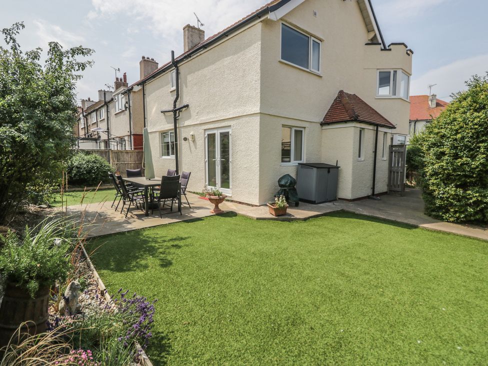 A house with a garden and furniture at Roma in Rhos-on-Sea