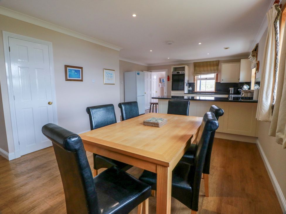 A dining area with table and chairs at Little Laight Cairnryan near Stranraer