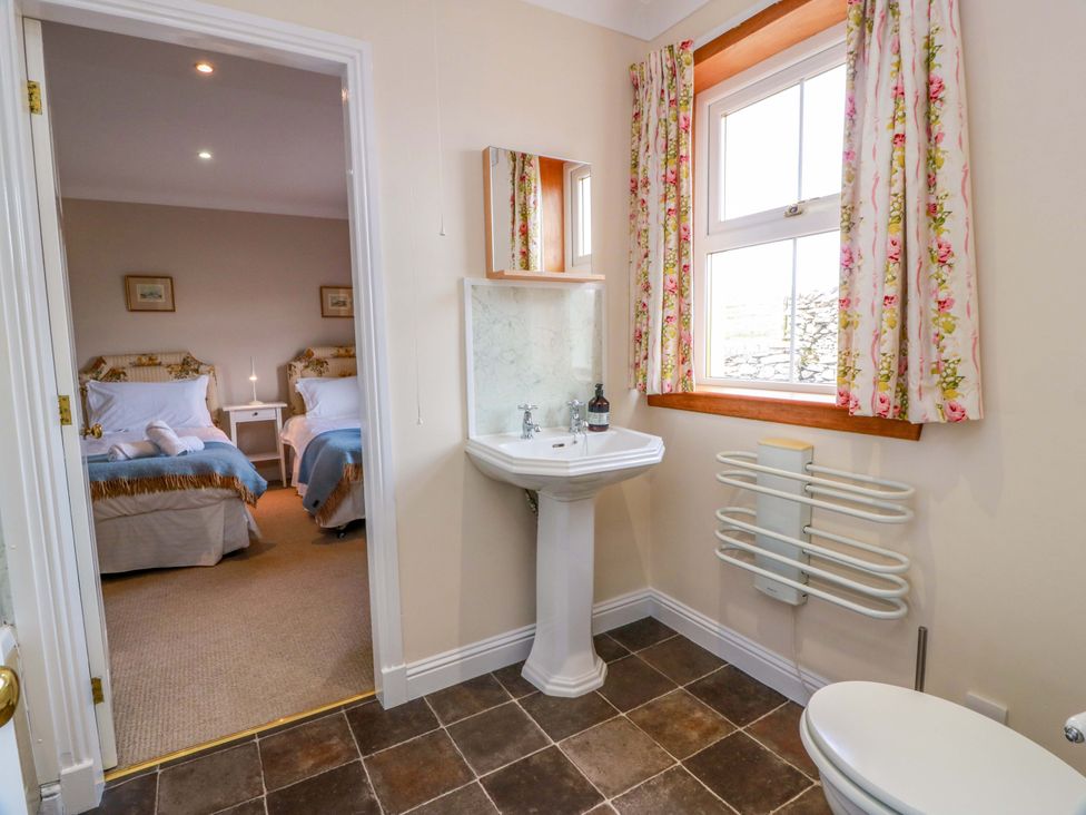A bathroom with a sink and toilet at Little Laight Cairnryan near Stranraer