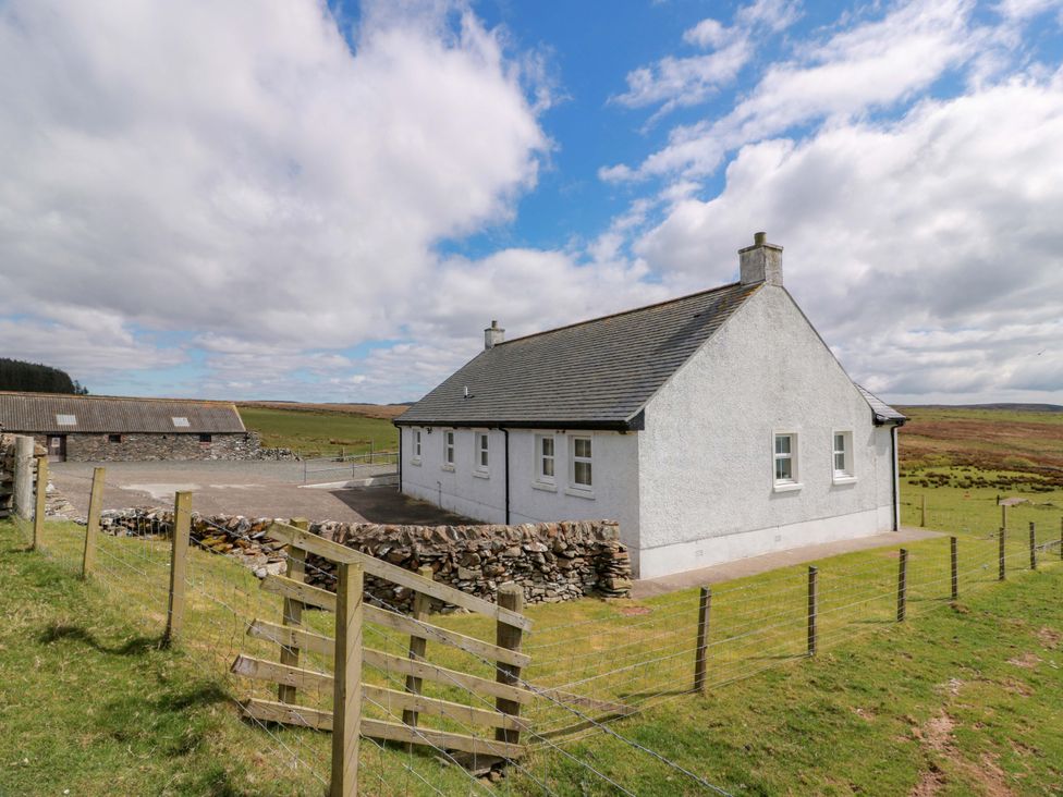 A house and barn in a field at Little Laight in Cairnryan near Stranraer