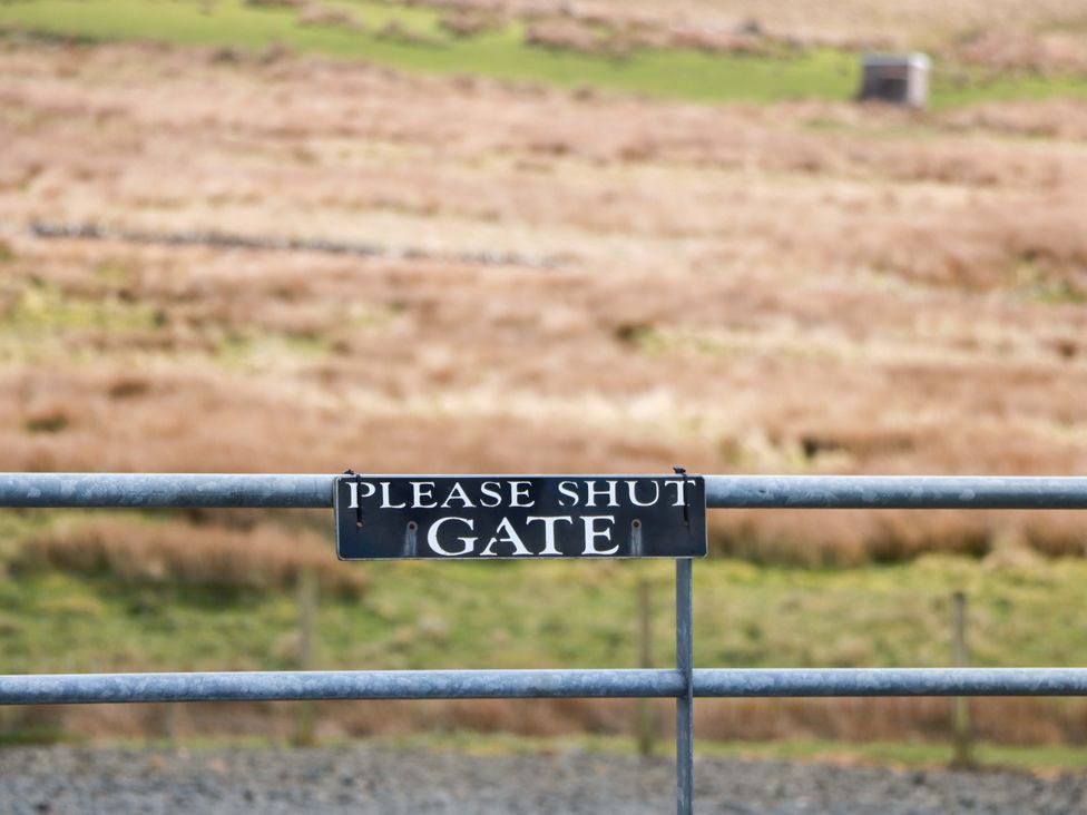 A gate with a sign that says please shut gate at Little Laight in Cairnryan near Stranraer