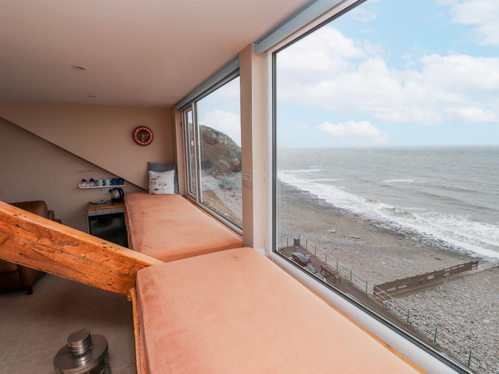 A living room with a view of the sea at The View in Criccieth