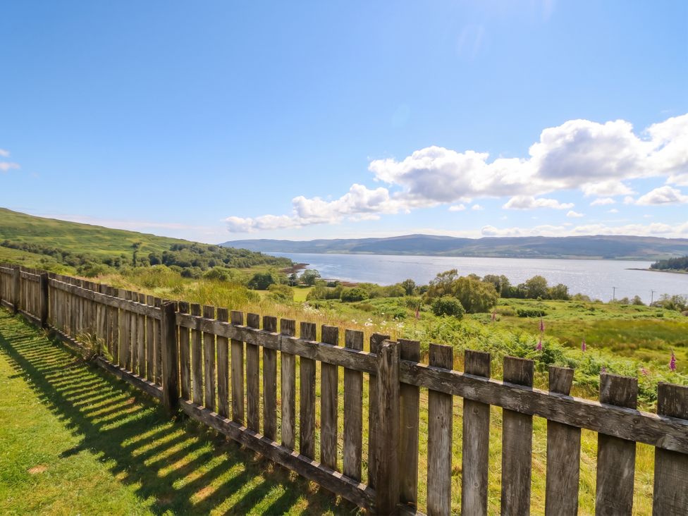 An outdoor view of water and mountains at Starfish Cottage, Craignure, Isle Of Mull