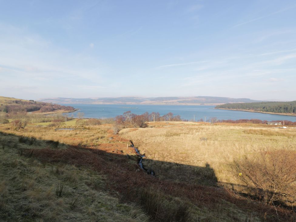 A landscape view of water and land at Poppies Cottage in Craignure, Isle Of Mull