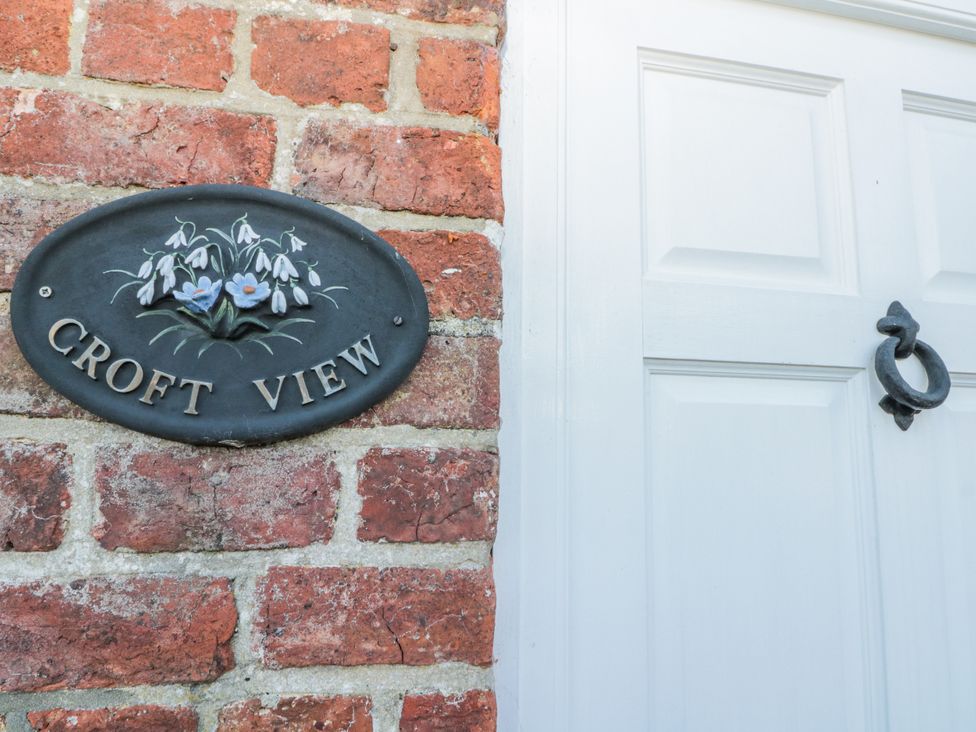 An entryway with a nameplate and door at Croft View in Fylingthorpe near Robin Hood's Bay