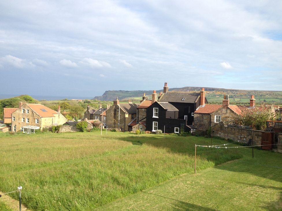 A view of houses and a field at Croft View in Fylingthorpe near Robin Hood's Bay