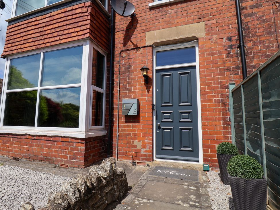 A front entrance with a door and window at 1 Roxby Terrace Thornton-le-Dale