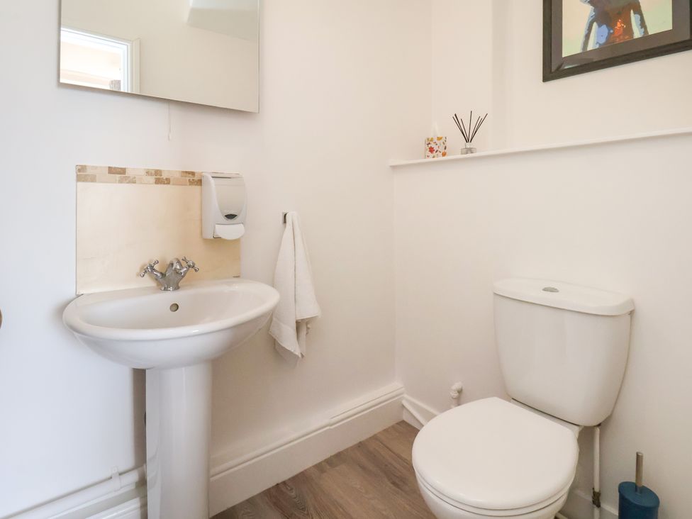A bathroom with a sink and toilet at 1 Roxby Terrace in Thornton-le-Dale