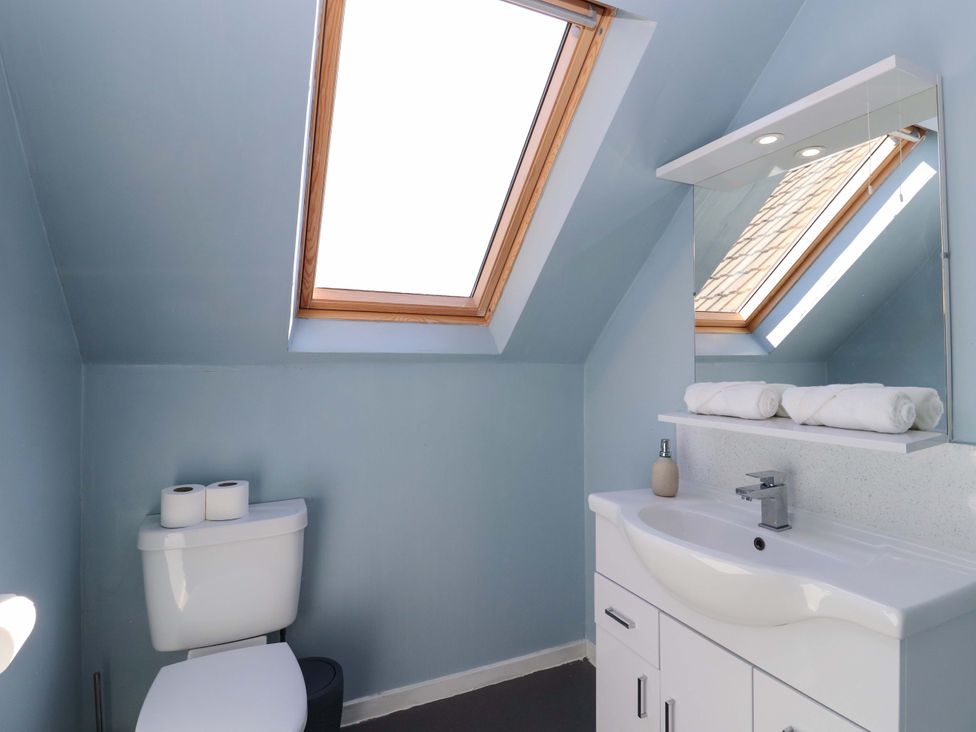 A bathroom with a sink and toilet at Ceól na Mara in Uig