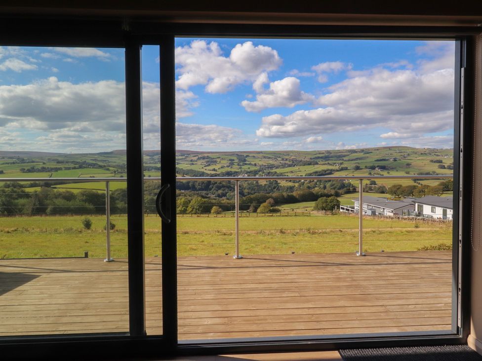 A view from a sliding door showcasing a landscape at Heath Hideaway in 