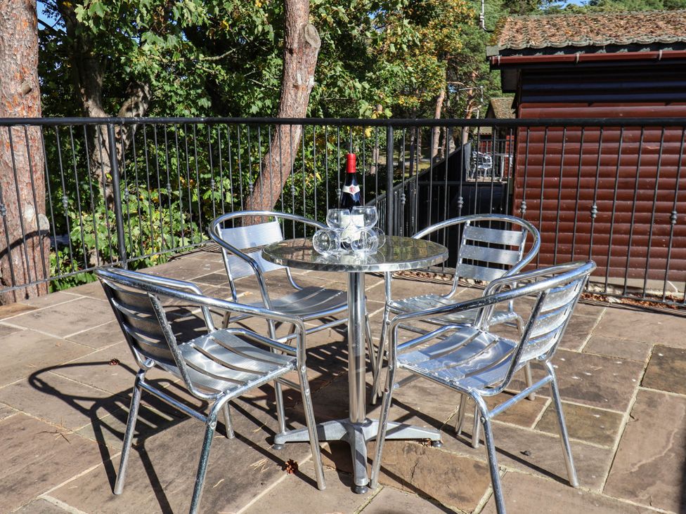 A table with chairs and wine at Snowdrop in Saltburn-by-the-Sea