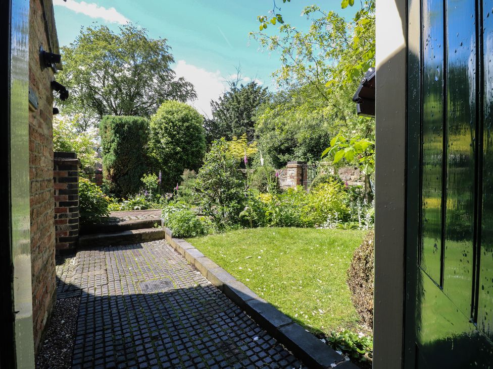 A garden view from the doorway at Just A Cottage, Newlands Farm, Golden Valley near Riddings and Alfreton