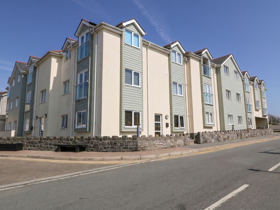 A residential building with multiple windows at Maelog, 14 Tides Reach Rhosneigr