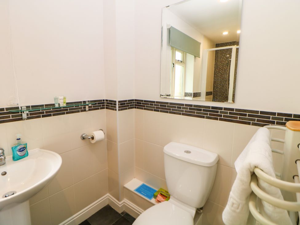 A bathroom with a sink and toilet at Wensley in Matlock