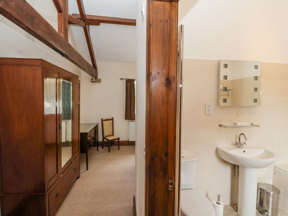 A bathroom with a sink and toilet at The Wagon Shed in Gransmoor near Bridlington