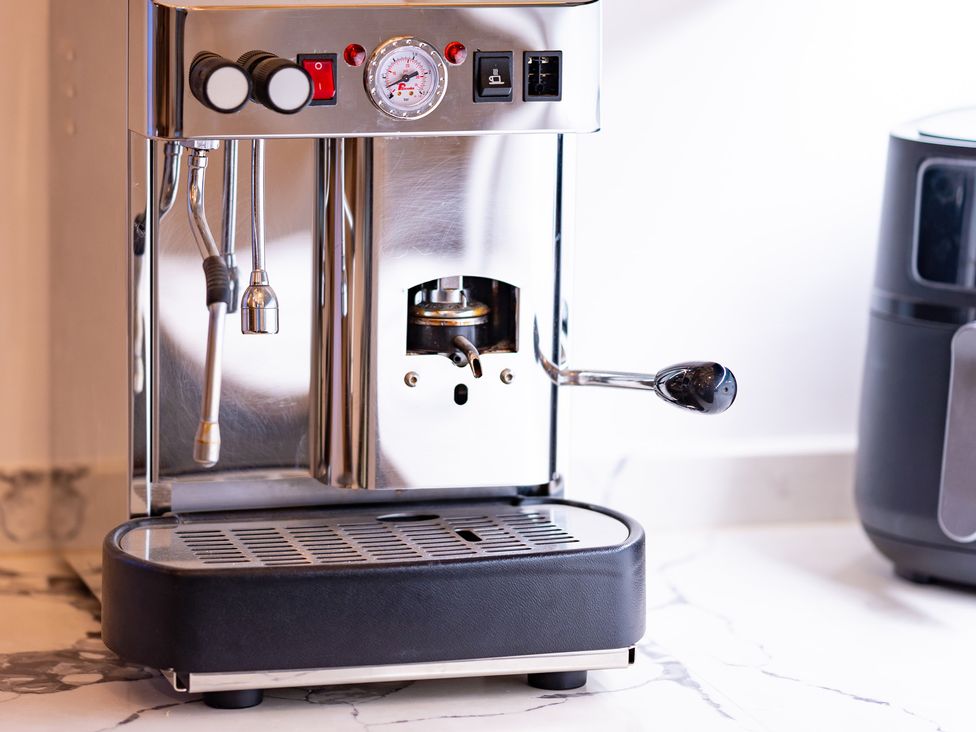 An espresso machine with a steam wand and pressure gauge at Wren Place Hall in Worsbrough