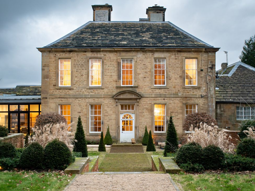 A building with windows and a doorway at Wren Place Hall in Worsbrough