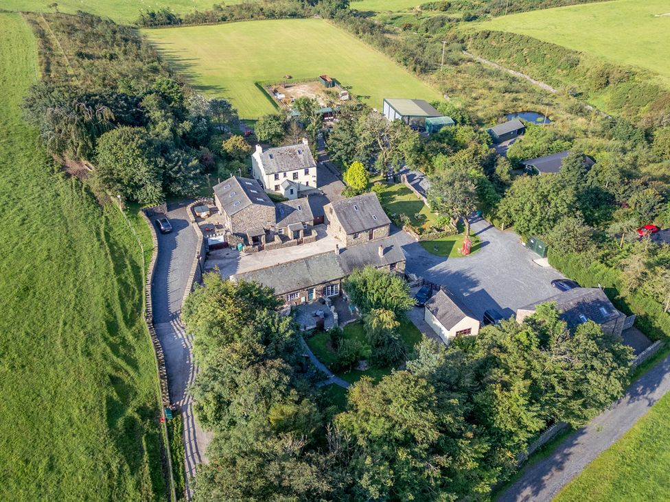 An aerial view of a property and its surroundings at Ash Lodge in Pennington near Ulverston